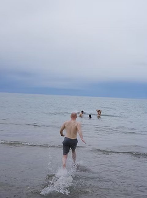 A guest running into open water